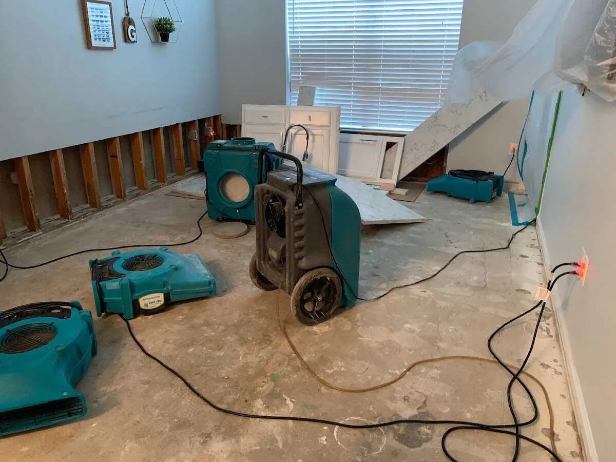 Dehumidifier in flood-cut room for Water Damage Restoration in Kokomo
